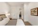 Cozy bedroom with neutral tones and ensuite access at 1405 Mataoka St, Mount Pleasant, SC 29464