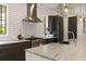 This kitchen has stainless steel appliances, designer hardware, bright lighting, and subway tile backsplash at 1405 Mataoka St, Mount Pleasant, SC 29464