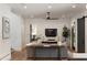 Bright living room features modern furnishings and a sleek ceiling fan at 1405 Mataoka St, Mount Pleasant, SC 29464