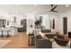 Open floor plan showcases the living room flowing into the modern kitchen at 1405 Mataoka St, Mount Pleasant, SC 29464