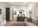 Cozy living room showcasing a stylish cabinet and view into the bathroom at 1405 Mataoka St, Mount Pleasant, SC 29464