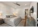 Beautiful bedroom featuring stylish decor, ceiling fan, natural light, and ensuite access at 1405 Mataoka St, Mount Pleasant, SC 29464