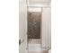 Modern shower featuring a subway tile surround and a white shower curtain at 1405 Mataoka St, Mount Pleasant, SC 29464