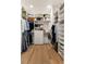 Organized walk-in closet with ample storage and custom shelving at 1405 Mataoka St, Mount Pleasant, SC 29464