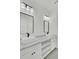 Modern bathroom featuring a double vanity with stylish black fixtures, vessel sinks, and open storage space at 142 Argosy Dr, Summerville, SC 29483