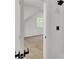 Stylish bathroom doorway view into bright bedroom with large window and shower at 142 Argosy Dr, Summerville, SC 29483
