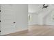Spacious bedroom with hardwood floors, a window, and a stylish interior door at 142 Argosy Dr, Summerville, SC 29483