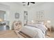 Bright, cheerful bedroom with wood flooring, featuring a neutral color palette and cozy decor at 142 Argosy Dr, Summerville, SC 29483