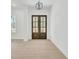 Bright foyer featuring a beautiful front door and wood-look flooring, creating a grand entrance at 142 Argosy Dr, Summerville, SC 29483