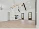 Bright living room with vaulted ceilings, modern fireplace, and abundant natural light at 142 Argosy Dr, Summerville, SC 29483