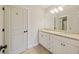 Bathroom featuring double sinks with granite countertops and white cabinets at 1506 Southwick Dr, Johns Island, SC 29455