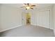 Neutral bedroom with a ceiling fan and a closet, providing ample storage space at 1506 Southwick Dr, Johns Island, SC 29455