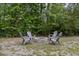 Backyard fire pit with seating, creating a cozy outdoor gathering space at 1506 Southwick Dr, Johns Island, SC 29455