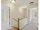 Upstairs hallway featuring carpet floors and access to multiple rooms at 1506 Southwick Dr, Johns Island, SC 29455