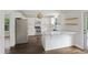 Bright kitchen featuring white cabinets, stainless steel appliances, granite countertops, and a kitchen island at 1506 Southwick Dr, Johns Island, SC 29455
