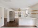 Bright kitchen featuring white cabinets, stainless steel appliances, granite countertops, and a kitchen island at 1506 Southwick Dr, Johns Island, SC 29455