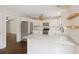 Modern kitchen featuring stainless steel appliances, white cabinetry, and granite countertops with breakfast bar at 1506 Southwick Dr, Johns Island, SC 29455