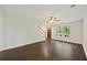 Bright living room with hardwood floors and natural light, staircase leading to upper level at 1506 Southwick Dr, Johns Island, SC 29455