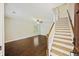 Bright living room with hardwood floors, staircase and lots of natural light at 1506 Southwick Dr, Johns Island, SC 29455