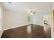 Bright living room with hardwood floors and large windows that provide natural light at 1506 Southwick Dr, Johns Island, SC 29455