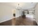 Spacious living space featuring hardwood floors and access to the kitchen and the laundry room at 1506 Southwick Dr, Johns Island, SC 29455
