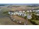 Coastal community with homes featuring private docks, complemented by views of the marsh and waterways at 156 Nobels Point St, Charleston, SC 29492