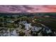Gorgeous sunset over neighborhood with lush green golf course and waterfront views at 156 Nobels Point St, Charleston, SC 29492