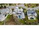 Scenic aerial view showcasing a luxury home with a pool, surrounded by manicured lawns at 156 Nobels Point St, Charleston, SC 29492