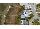 Overhead view of a luxury home with pool and private dock, beautifully integrated into the landscape at 156 Nobels Point St, Charleston, SC 29492