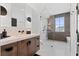 Modern bathroom boasts a marble vanity, mosaic shower, and sleek black hardware at 156 Nobels Point St, Charleston, SC 29492