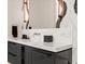 Modern bathroom vanity featuring a sleek countertop, stylish fixtures, and a decorative marble accent wall at 156 Nobels Point St, Charleston, SC 29492