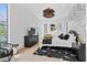 Bright bedroom with black and white accents, patterned wallpaper, stylish lighting and large windows at 156 Nobels Point St, Charleston, SC 29492