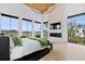 Bright bedroom features a fireplace, large windows with serene views, and neutral tones for a relaxing space at 156 Nobels Point St, Charleston, SC 29492