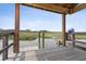 Scenic view from under the covered area of a dock, showcasing the peaceful waterway at 156 Nobels Point St, Charleston, SC 29492