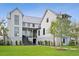Beautifully landscaped lawn and well-maintained facade for great curb appeal at this immaculate two-story home at 156 Nobels Point St, Charleston, SC 29492
