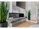 Contemporary fireplace with marble wall, offering a sleek and cozy focal point at 156 Nobels Point St, Charleston, SC 29492