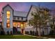Elegant home with meticulously landscaped front yard, featuring a covered porch at 156 Nobels Point St, Charleston, SC 29492