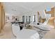 Open-concept layout with elegant seating, stylish lighting, and a staircase enhancing the modern aesthetic at 156 Nobels Point St, Charleston, SC 29492