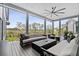 Relax on this covered outdoor living space with views of a grassy marsh at 156 Nobels Point St, Charleston, SC 29492