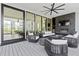 Covered outdoor patio featuring sleek furniture, a fireplace, and outdoor views at 156 Nobels Point St, Charleston, SC 29492