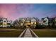 Stunning waterfront home with inviting backyard and a private wooden walkway at 156 Nobels Point St, Charleston, SC 29492
