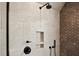 The large walk in shower features a rain shower head, built in shelving, and mosaic tile at 156 Nobels Point St, Charleston, SC 29492