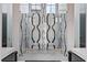 Modern shower featuring dual shower heads with patterned tile and glass doors creates a spa-like experience at 156 Nobels Point St, Charleston, SC 29492