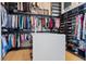 Spacious walk-in closet with ample shelving, hanging space, and a central island for organization at 156 Nobels Point St, Charleston, SC 29492