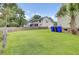 Wide green backyard featuring lawn and wooden privacy fence for added seclusion at 16 Oatly Cir, Charleston, SC 29414