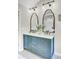 Elegant bathroom features double vanity with marble countertop, modern fixtures, and wall art at 16 Oatly Cir, Charleston, SC 29414