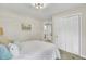 Comfortable bedroom features a wrought iron bed frame and closet at 16 Oatly Cir, Charleston, SC 29414