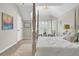 Primary bedroom features a four poster bed and shuttered windows at 16 Oatly Cir, Charleston, SC 29414
