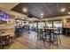 Spacious dining area featuring wood floors, ample seating, and large windows overlooking the grounds at 16 Oatly Cir, Charleston, SC 29414