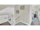 Second story hallway features an open view to the lower level and access to bedrooms at 16 Oatly Cir, Charleston, SC 29414